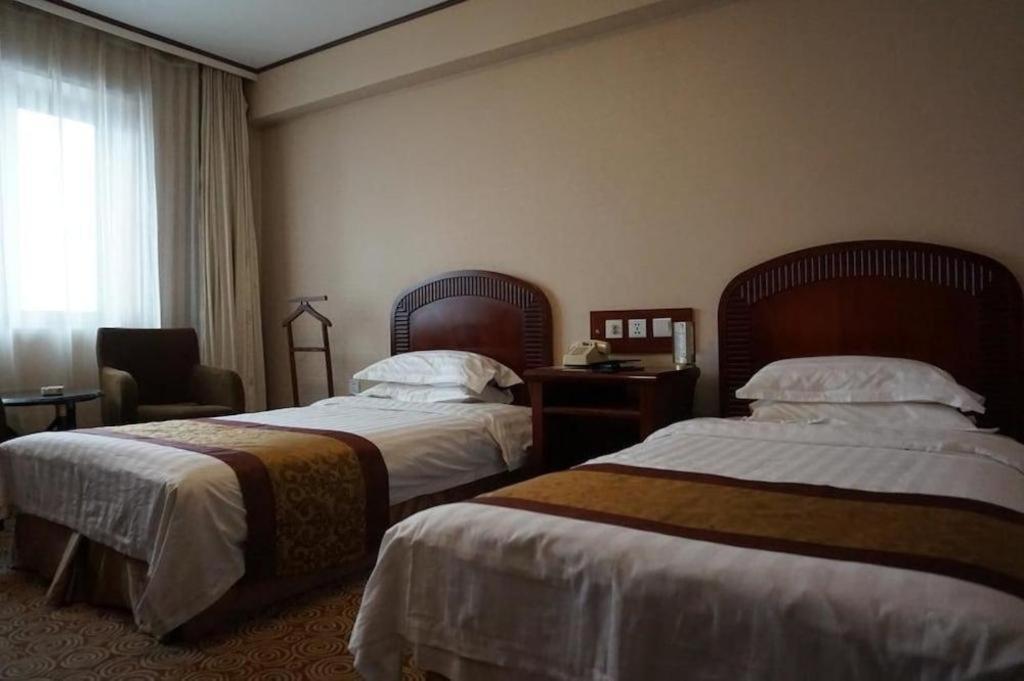 Heilongjiang Kunlun Hotel Harbin Exterior photo