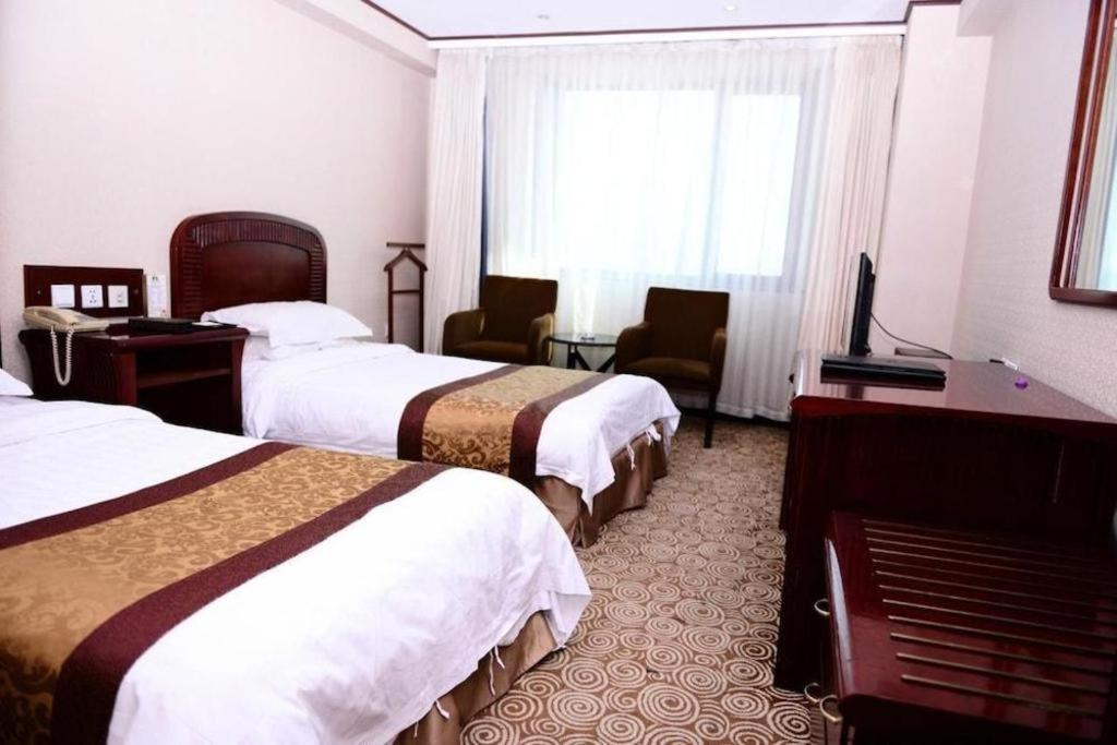 Heilongjiang Kunlun Hotel Harbin Exterior photo