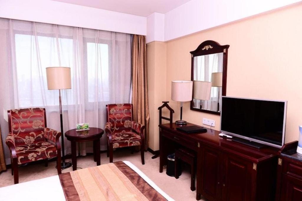 Heilongjiang Kunlun Hotel Harbin Exterior photo