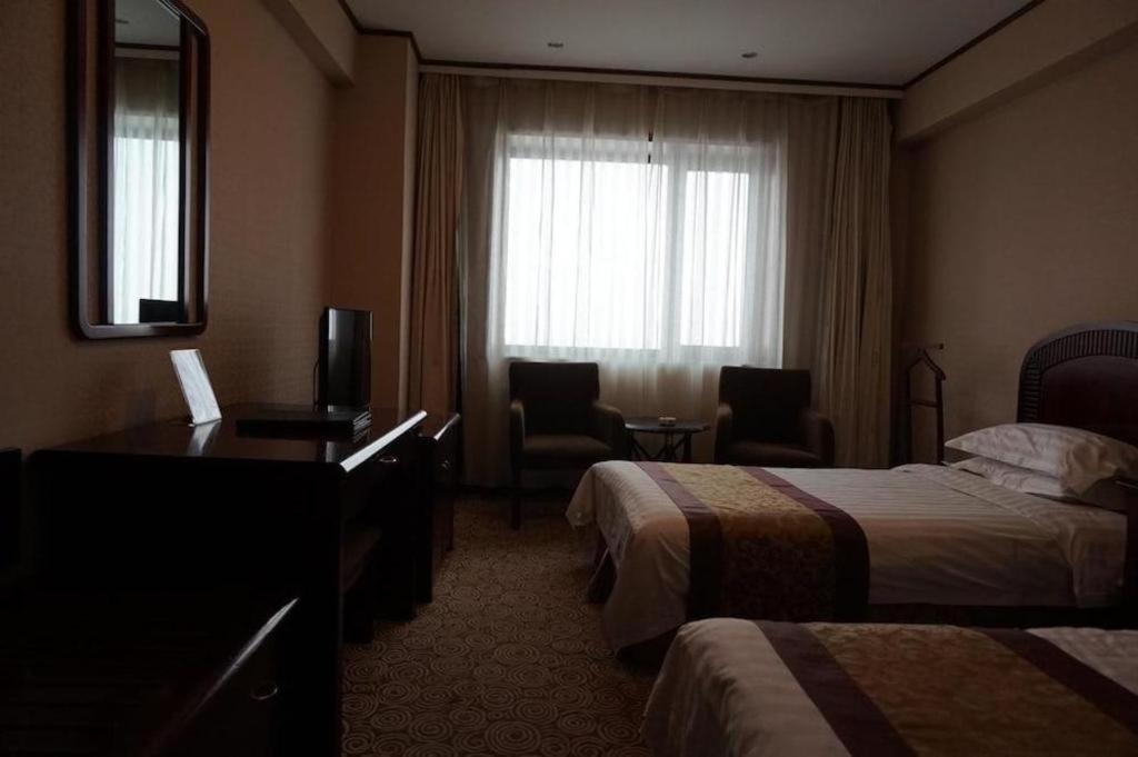 Heilongjiang Kunlun Hotel Harbin Exterior photo