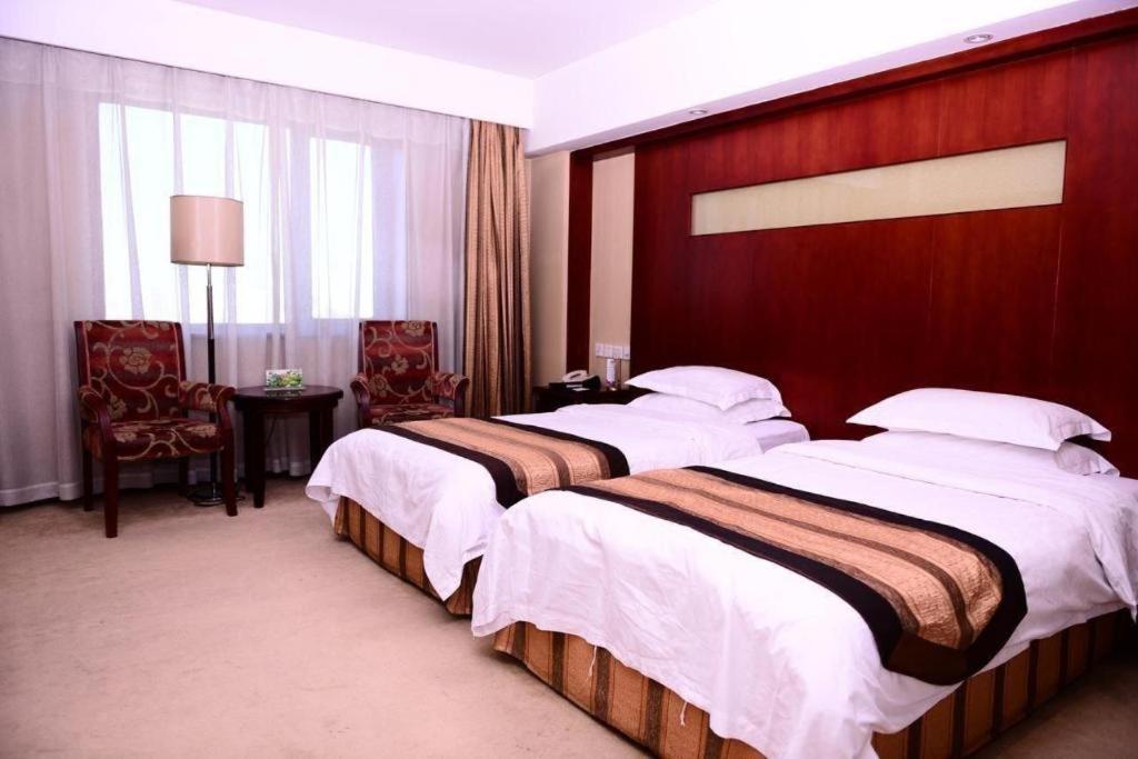 Heilongjiang Kunlun Hotel Harbin Exterior photo