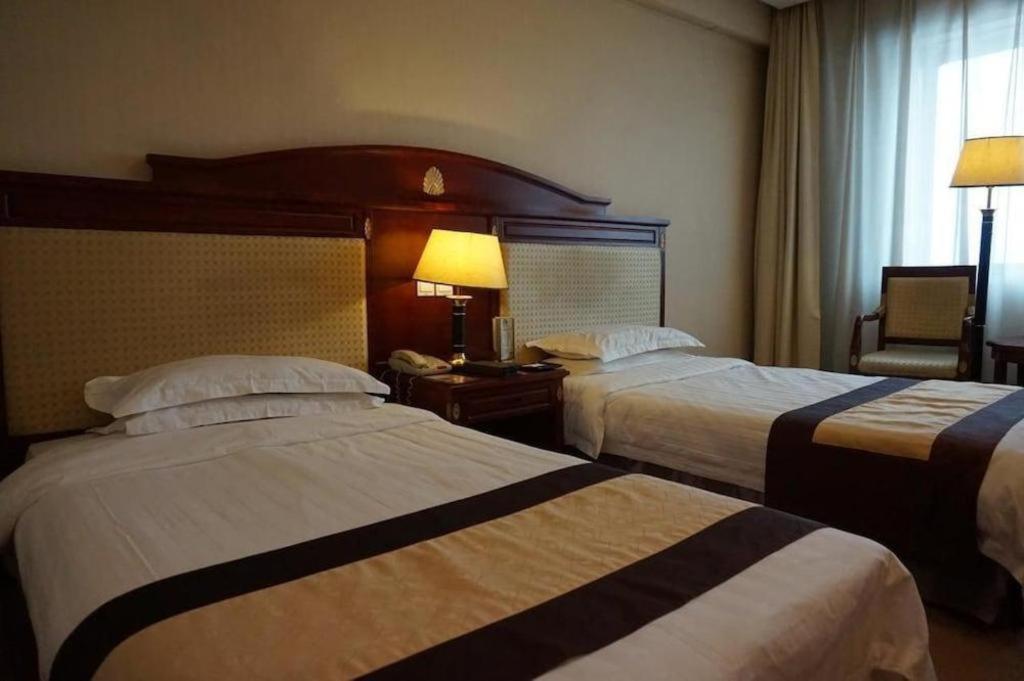 Heilongjiang Kunlun Hotel Harbin Exterior photo