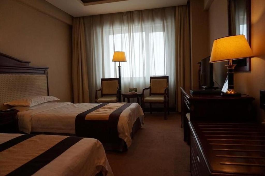 Heilongjiang Kunlun Hotel Harbin Exterior photo
